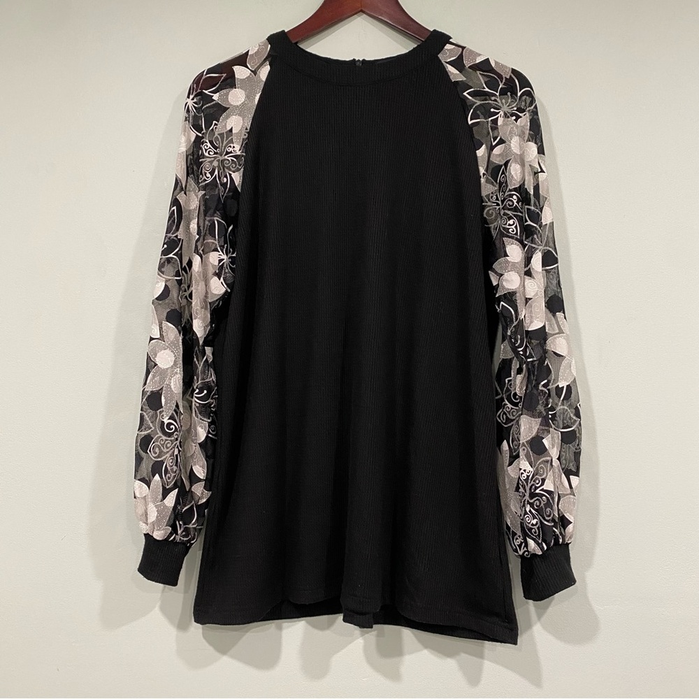 Elegant black knit top by MIHOLL featuring delicate Floral lace sleeves Size XL